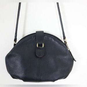 Coach: vintage Laurel Blue leather calm shell shoulder crossbody bag.
